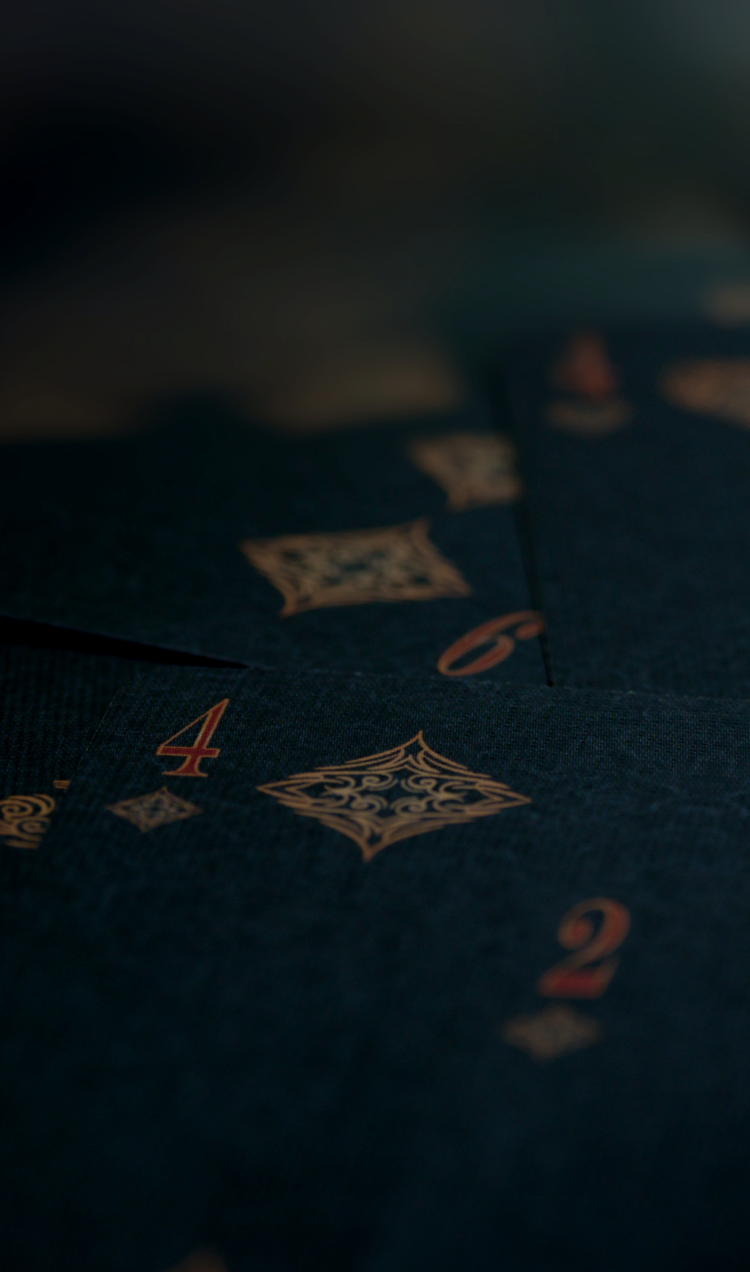 Black embossed playing cards.