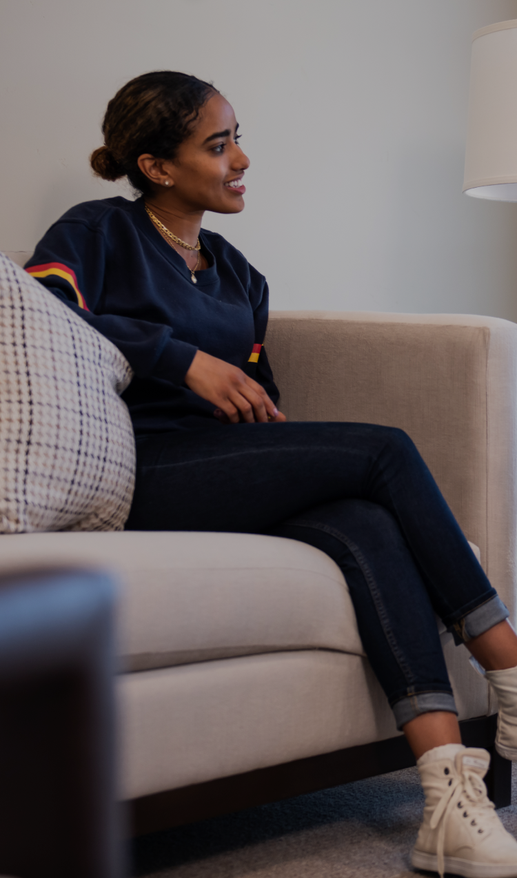 A client sits with her therapist to talk about treatment.