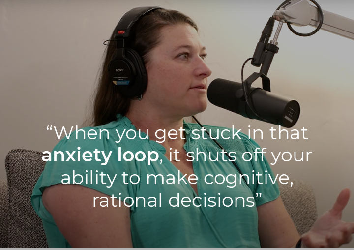 Joanna Kluender speaking into a podcast microphone with a text overlay: 