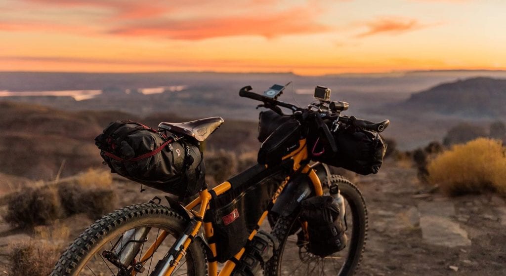 mountain bike parked over mountains - APN Lodge