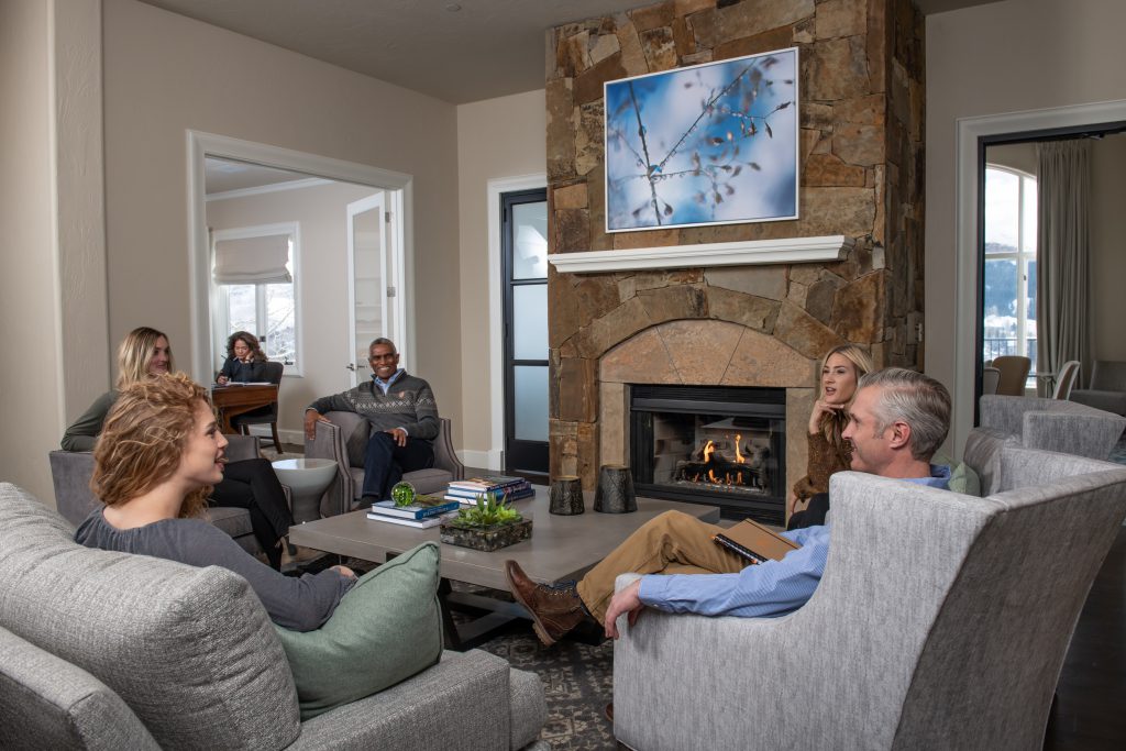 Clients in a group therapy session at the chalet at All Points North Lodge.