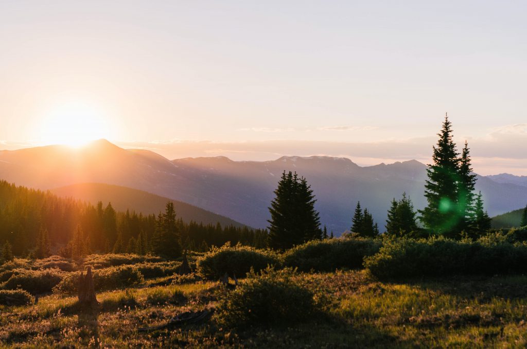 Sunrise breaking over the mountains in Colorado.