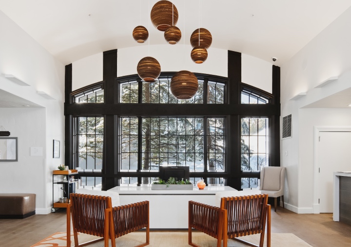 Entryway with Large Windows, Desk, and Chairs