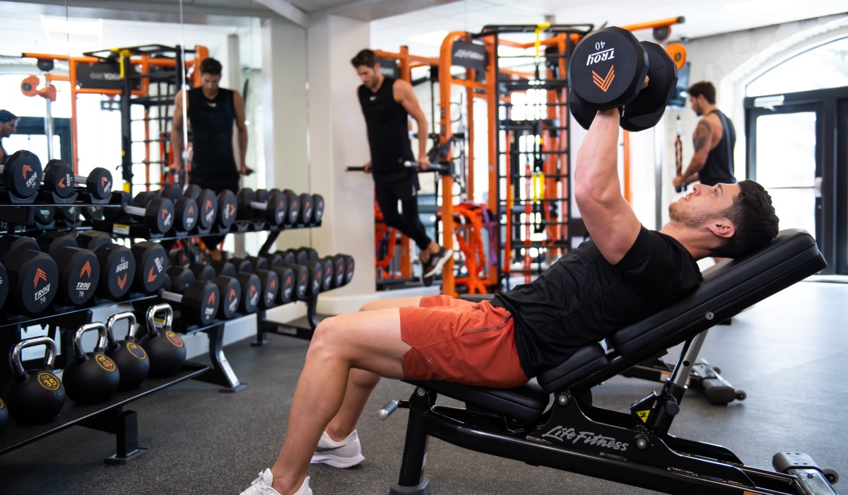 Man Lifting Weights in APN Gym