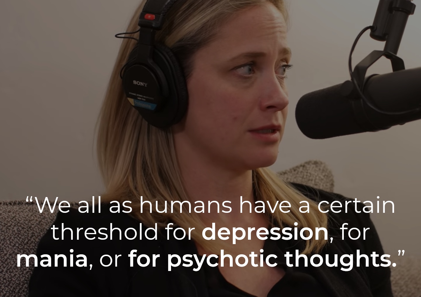 Dr. Kate Daly speaking into a podcast microphone with a text overlay: