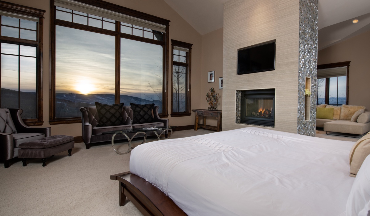 Bedroom with mountain window view