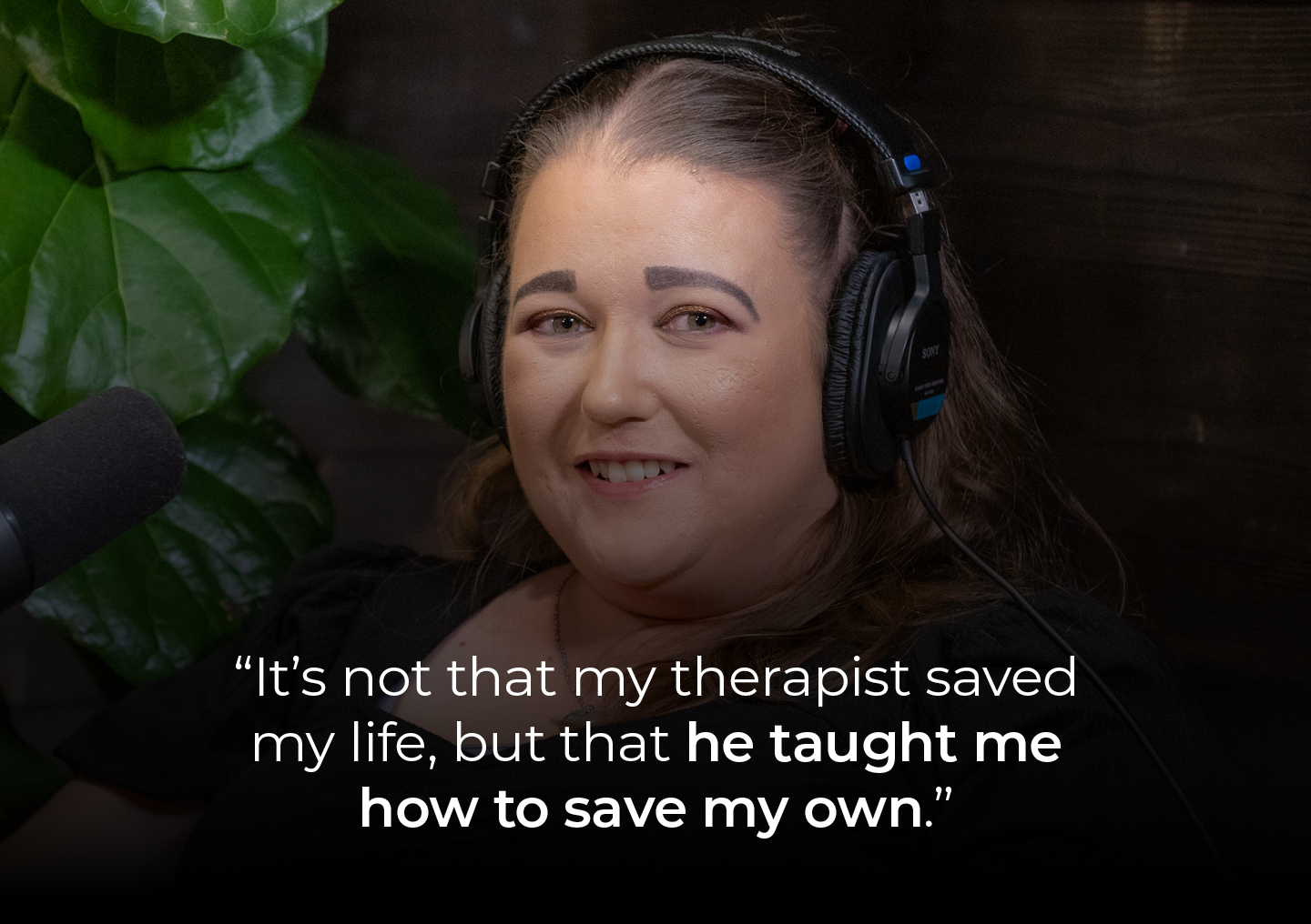 Christine speaking into a podcast microphone with a text overlay: It’s not that my therapist saved my life, but that he taught me how to save my own.