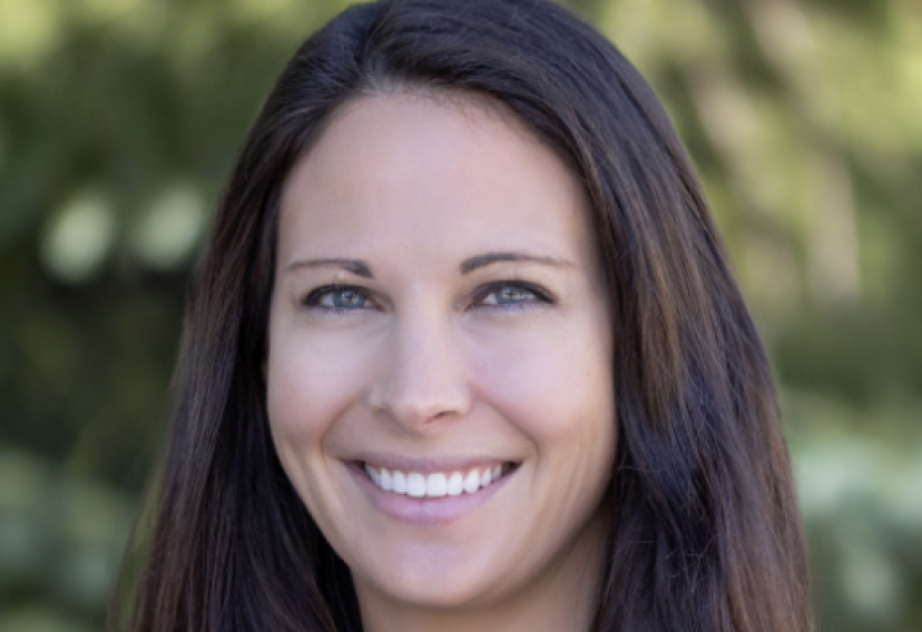 Jessica Pirie, Clinical Manager at All Points North Lodge, smiling with a natural background, emphasizing her role in mental health recovery and therapy.