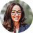 Headshot of Marina Pitsilos in front of a blurred forest background.