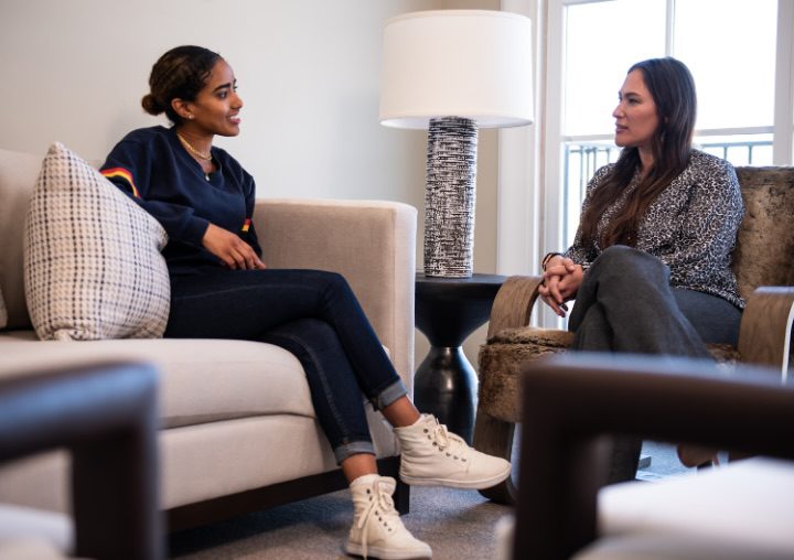 A client sits with a therapist during a treatment session at All Points North.